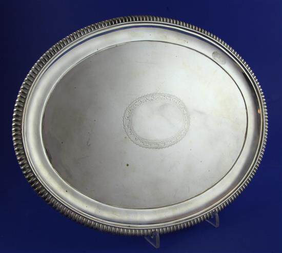 A late Victorian silver oval meat dish, 14in.